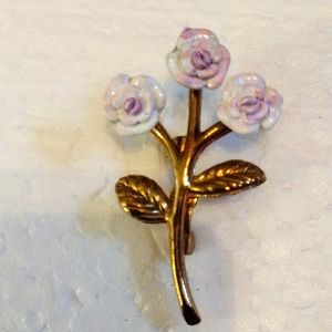 Beautiful faux gold and enamel painted floral brooch.